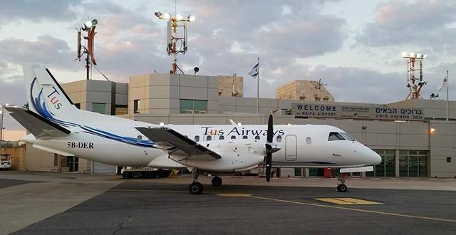 מטוס של טוס בנמל התעופה של חיפה. צילום יח"צ